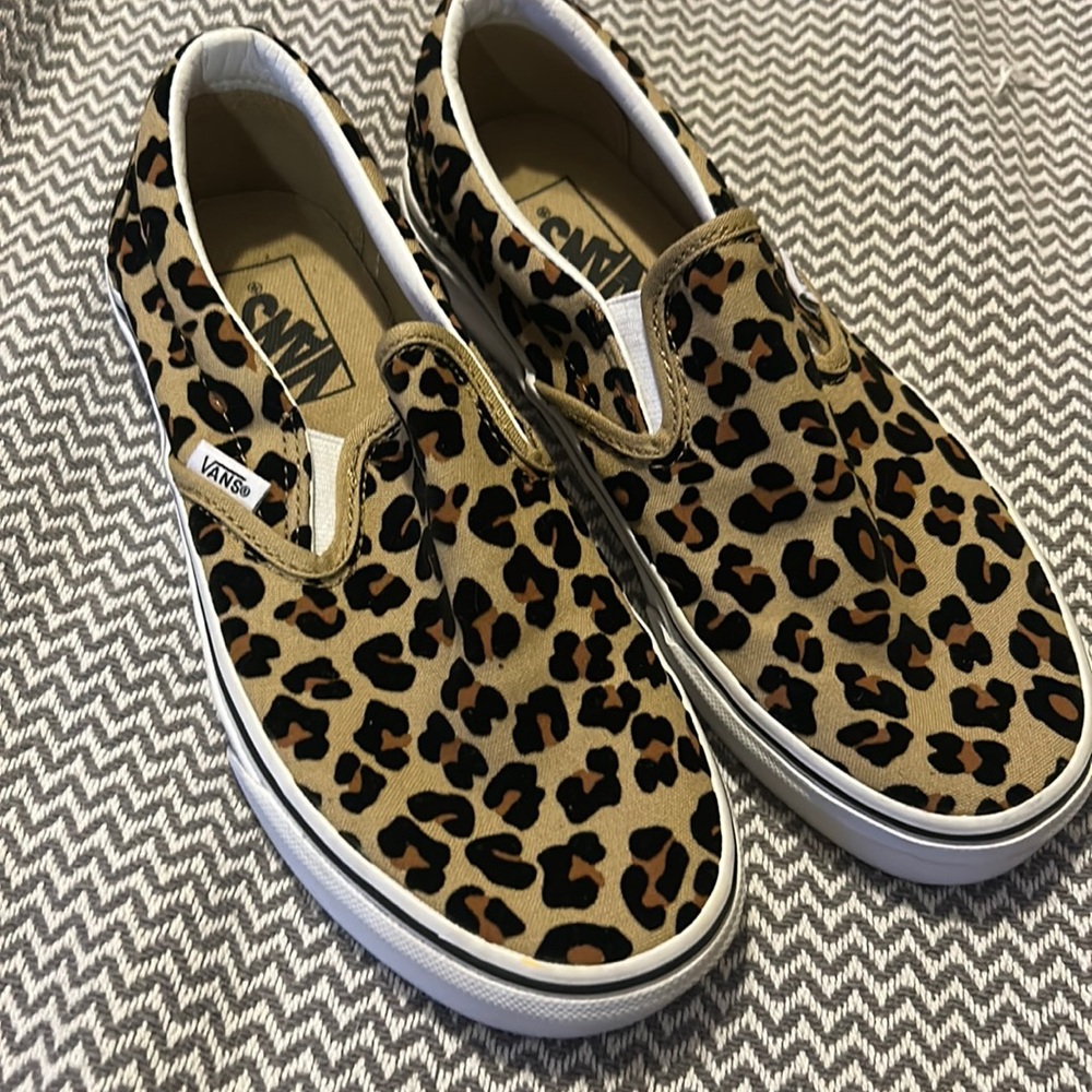 Leopard print Vans.